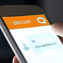 Close-up of a smartphone screen showing a message in a live chat