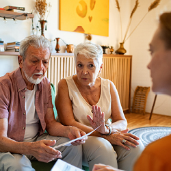 A close-up of a passport with two printed flight tickets inside