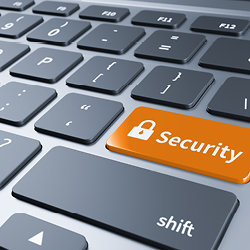 View of a computer keyboard with a blue key featuring a padlock symbol and the word &ldquo;Security&rdquo;